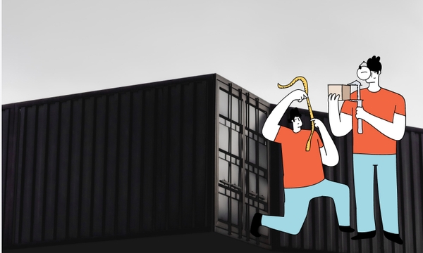 Two characters measuring cargo to decide whether a 20 foot container is enough for the cargo.