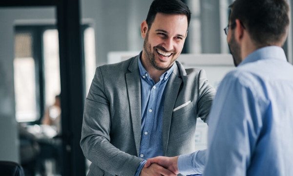 Customs broker and customs agent shaking hands after agreeing on your shipment with SHipa Freight