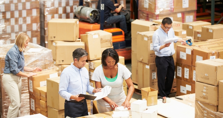 workers in a warehouse to show how an international freight carrier works