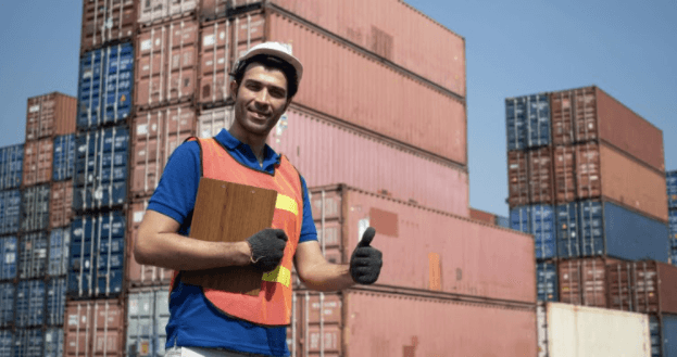 Person standing next to container after customs check passed thanks to certificate of origin when shipping with Shipa Freight