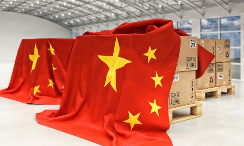 Pallets with boxes covered by Chinese flag