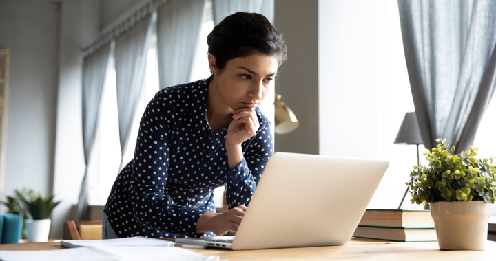 Person looking at the computer to check the prices with Shipa Freight during the peak season.