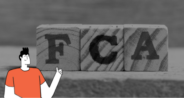 Person standing next cubes spelling FCA for the Incoterm FCA when shipping with Shipa Freight.