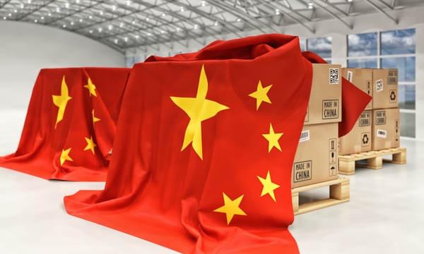 Chinese flag over boxes of cargo to represent Shipa Freight's guide to exporting goods from China.